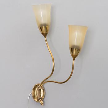 A 1940s wall light for Taito Oy, Finland.