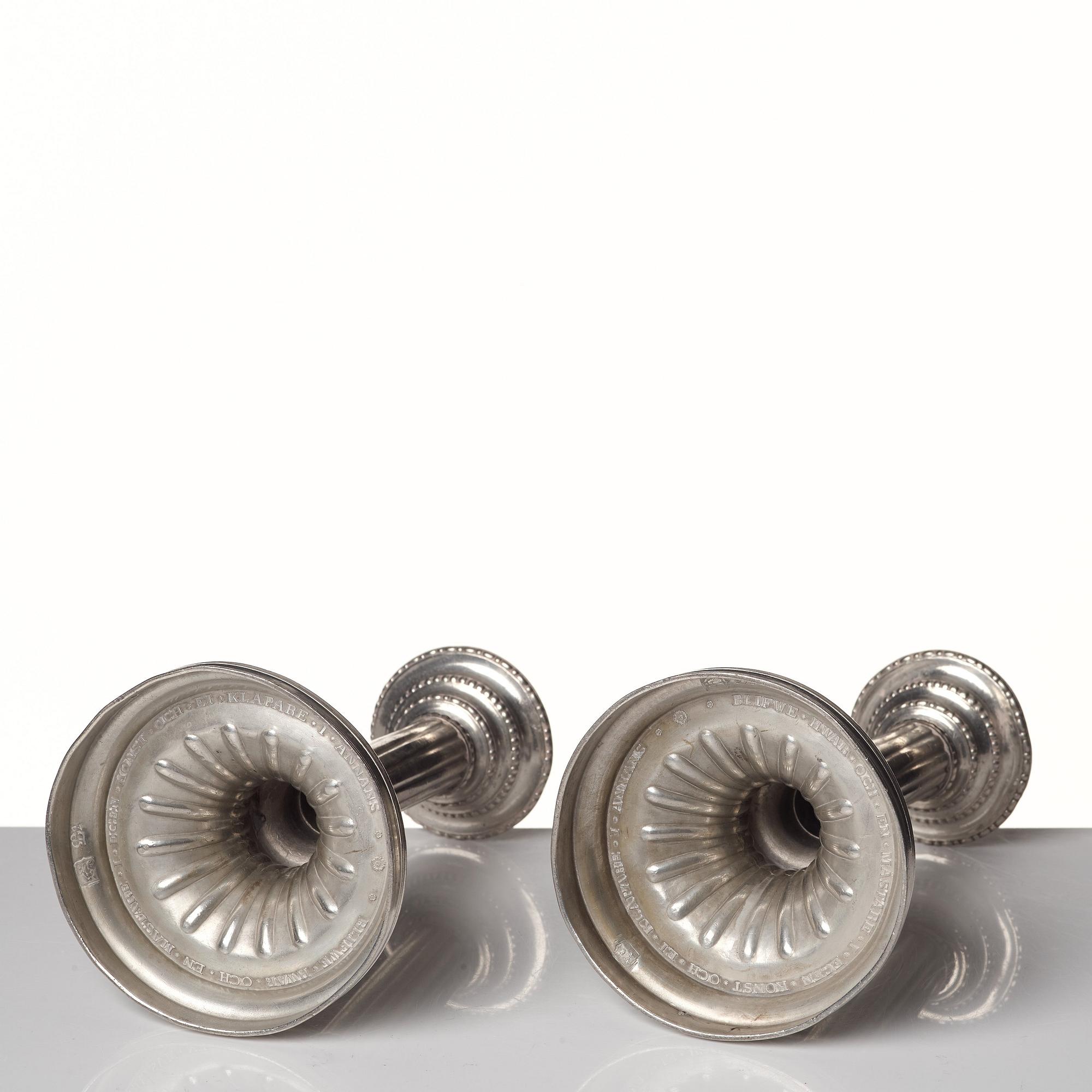 A pair of Gustavian pewter candlesticks by R Ryman 1784.