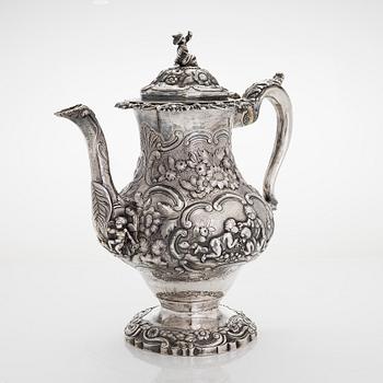 A Georgian seven-piece, sterling silver tea and coffee set, maker's mark of Joseph Angell, London 1817-1823.