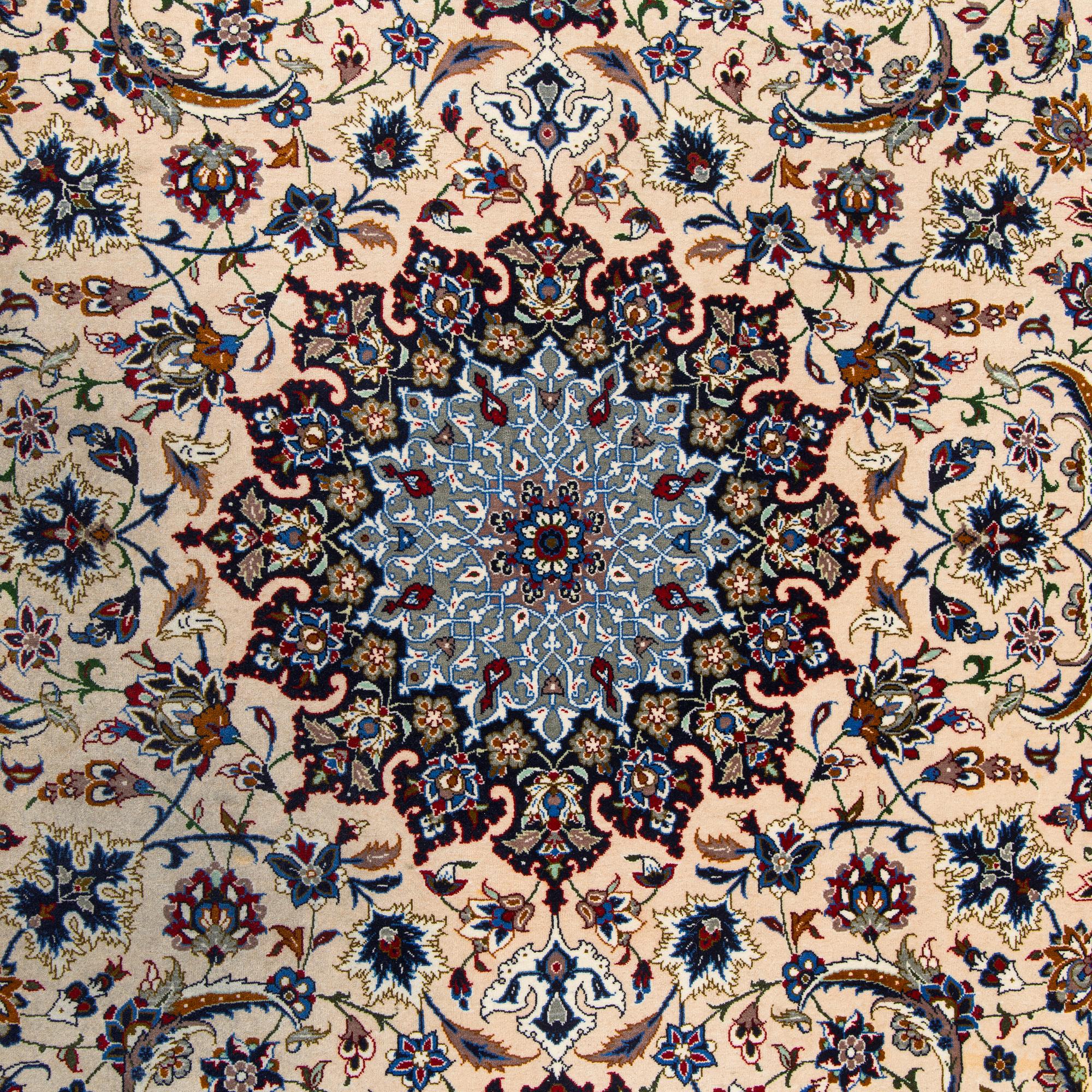 A semi-antique Isfahan rug, central Persia, signed c. 238 x 165 cm.