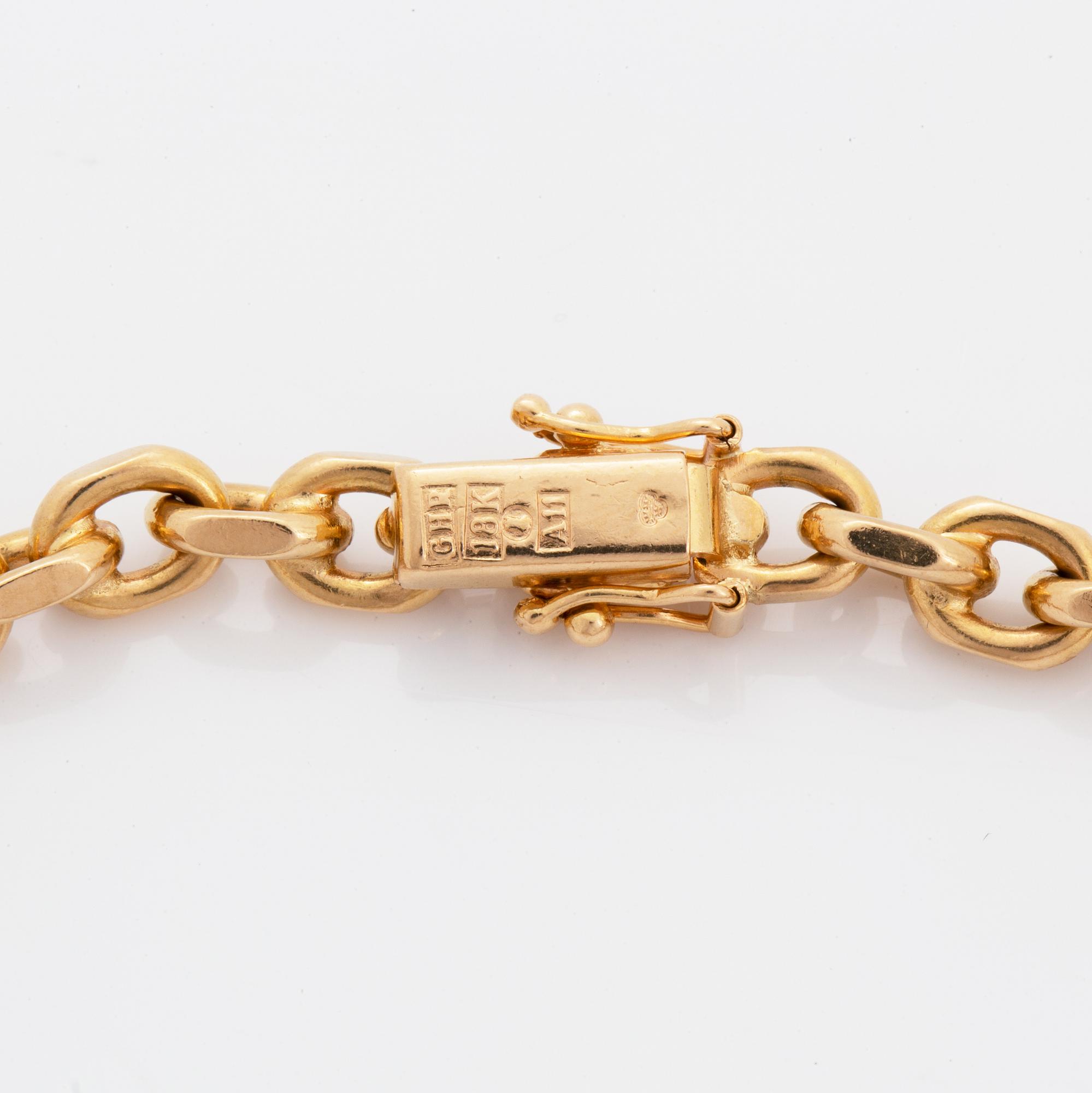 18K gold heart pendant with chain.