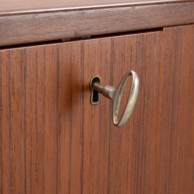 A teak veneered sideboard, mid 20th Century.