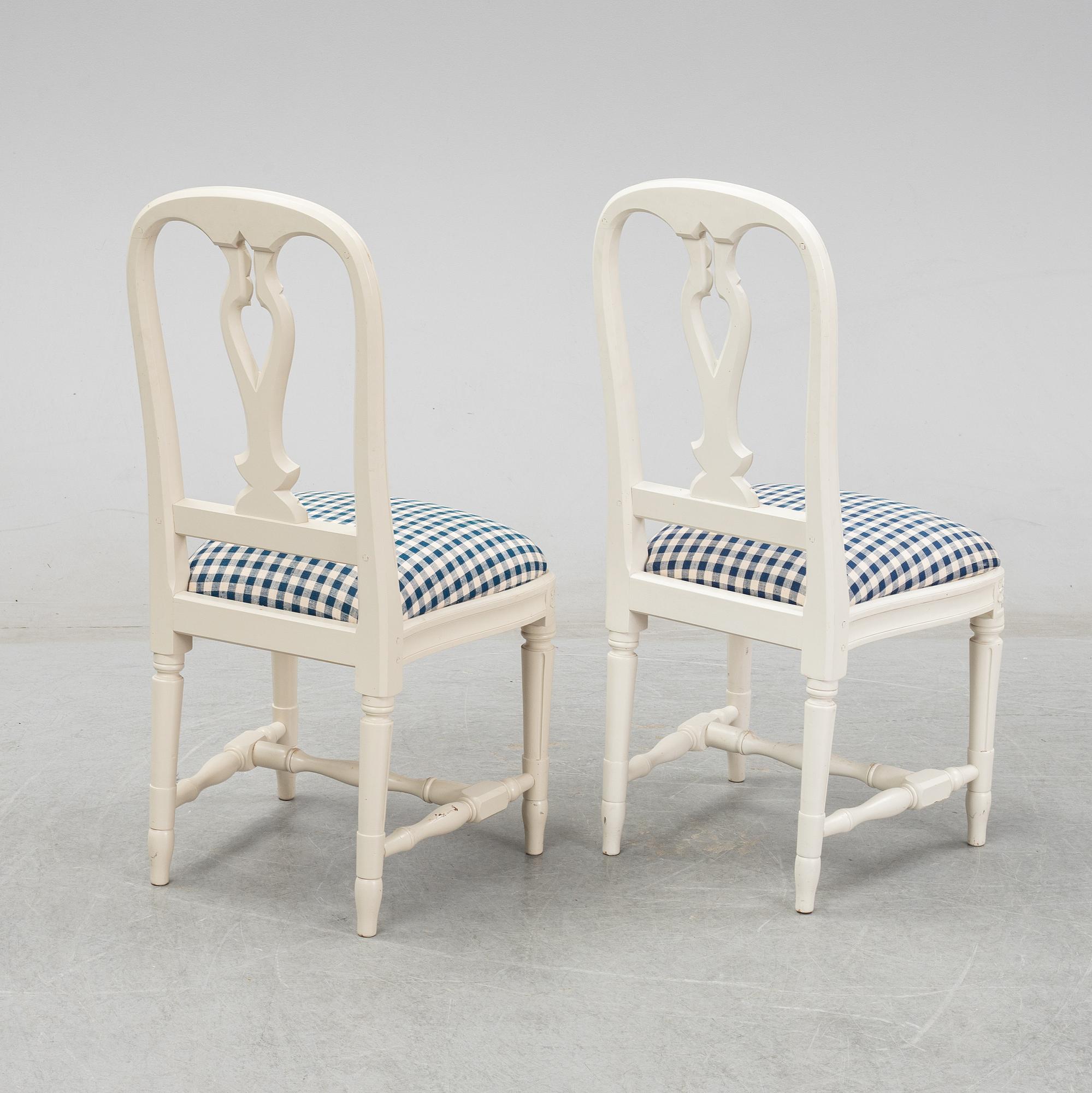 Eight Gustavian style 'Hallunda' chairs from IKEA.