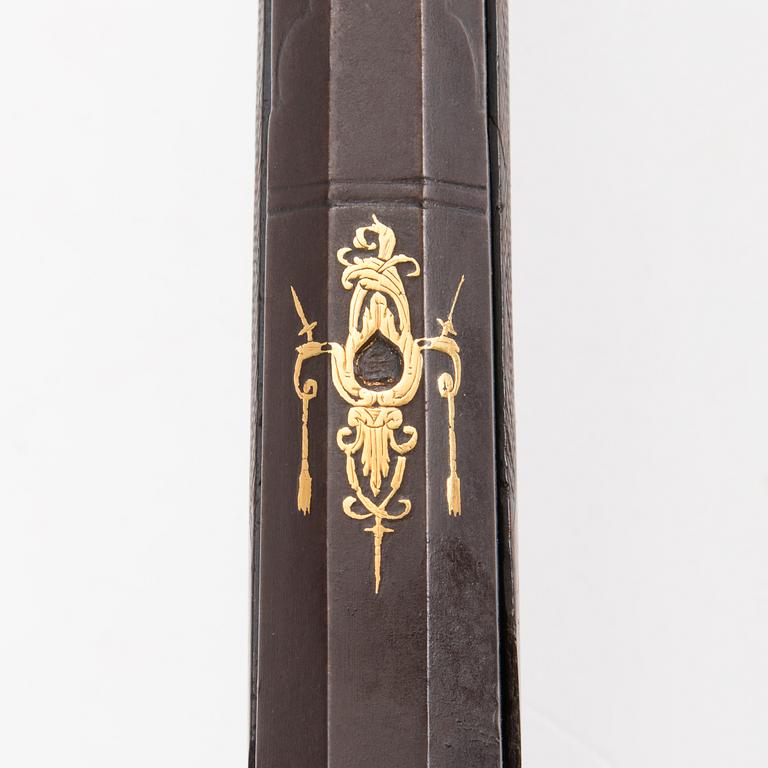A mid 19th Century percussion rifle.