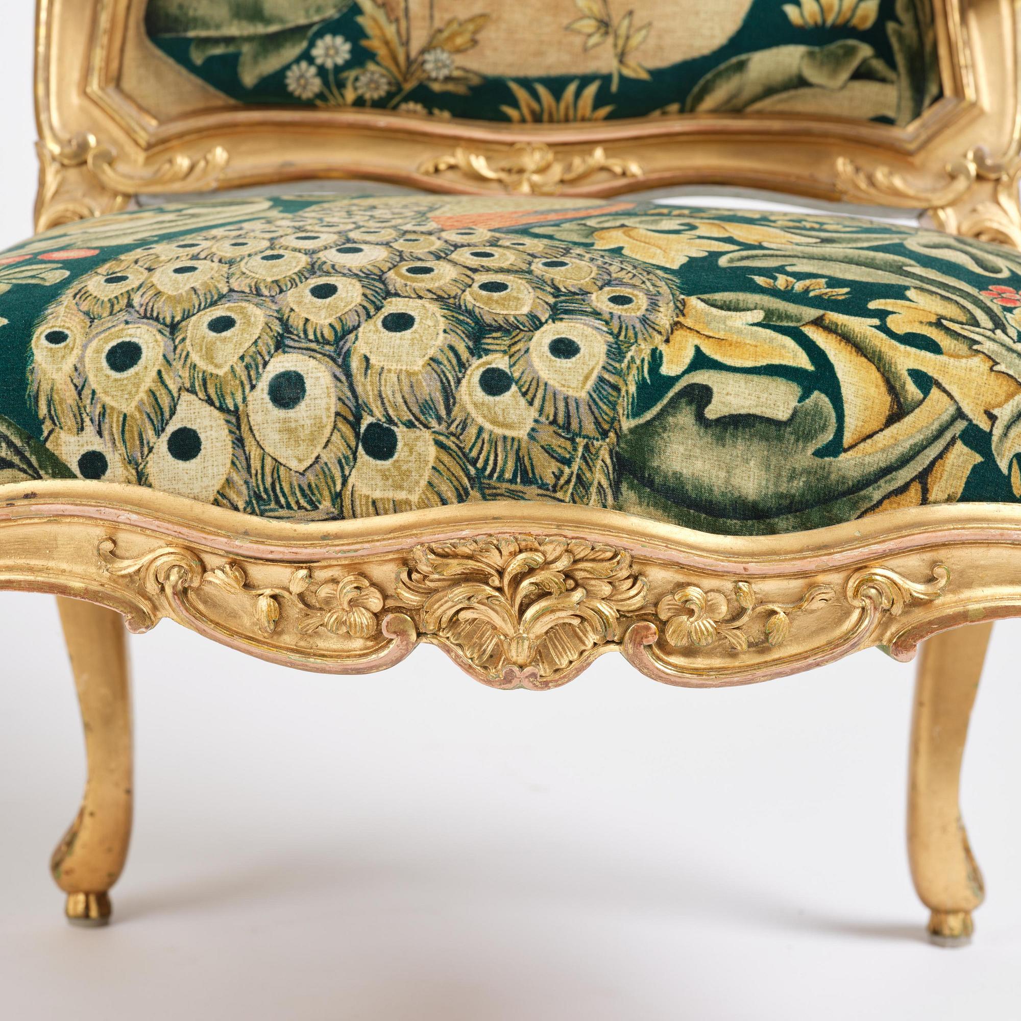 A pair of Louis XV-style giltwood fauteuils, late 19th century.