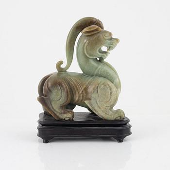 A green stone sculpture, China, 20th century.