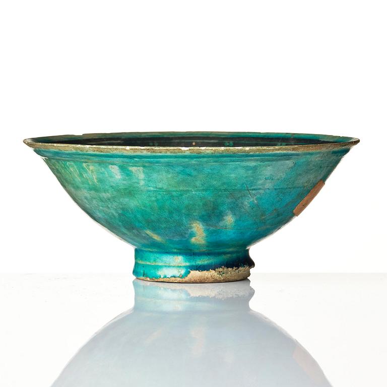 A conic Kashan pottery bowl, central Persia, 11th century.