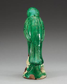 A green glazed falcon, Qing dynasty.