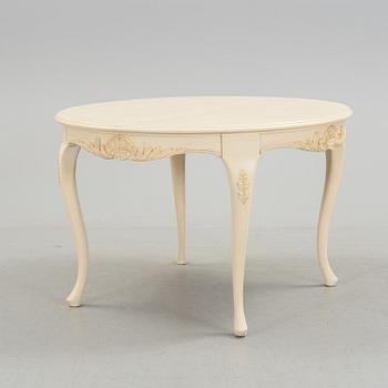 A mid 20th century rococo style dining table.