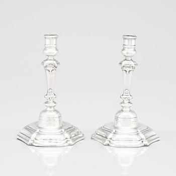 A pair of Swedish 18th century silver candlesticks, marks of Petter Lund, Stockholm 1758.