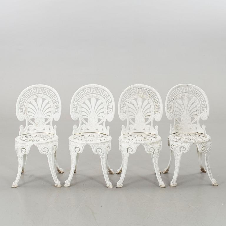 A SET OF FOUR GARDEN CHAIRS AND A GARDEN TABLE, second half of 20th century.