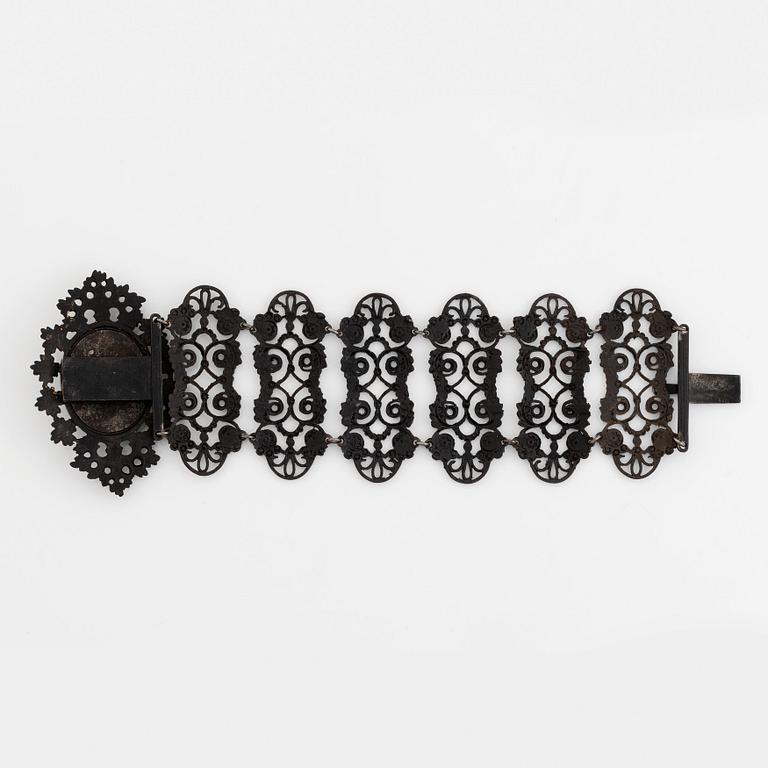 A Berlin iron and steel bracelet with a cameo.