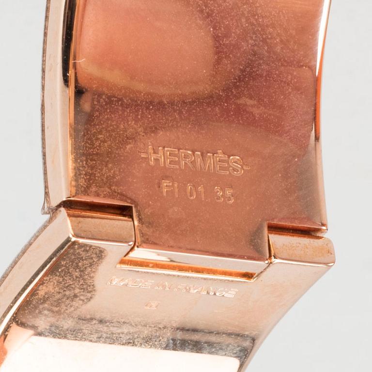 A Hermès "Clic-H" bracelet.