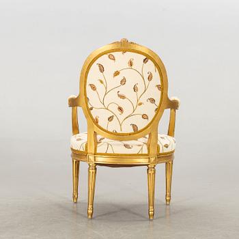 A Gustavian style armchair, 20th century.