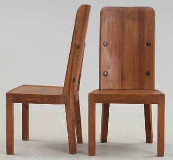 A pair of Axel Einar Hjorth stained pine chairs, 'Lovö', Nordiska Kompaniet, 1930's.