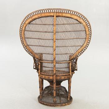 A rattan chair later part of the 20th century.