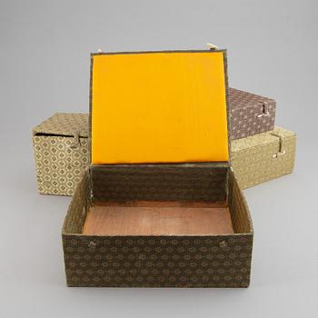 A set of six silk clad boxes, China, 20th Century.