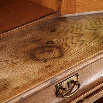 An oak art noveau cabinet, early 20th Century.