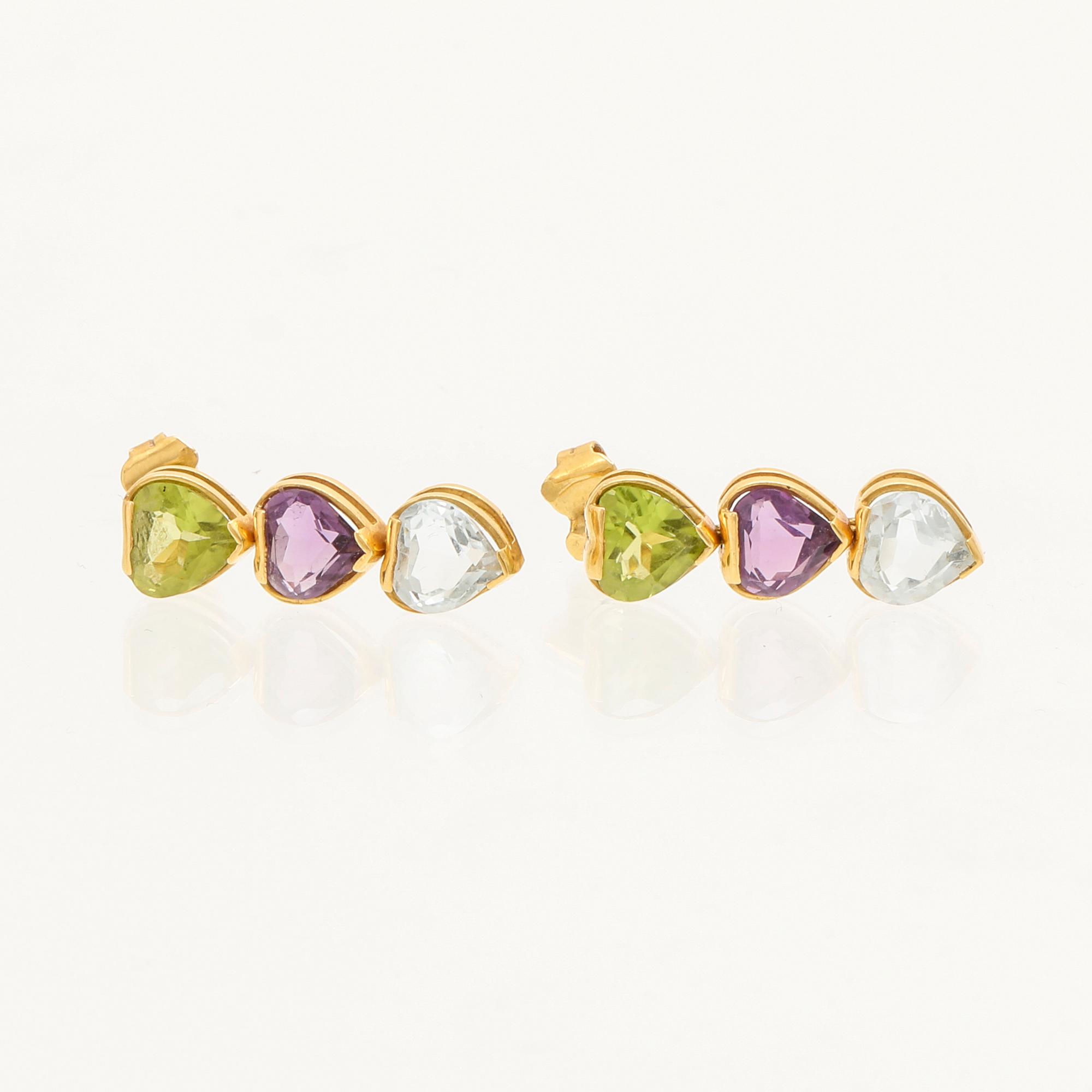 H. Stern örhängen 18K guld, hjärtslipade peridoter, ametister och topaser.