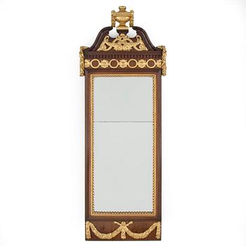 A first half of the 19th century empire mirror.