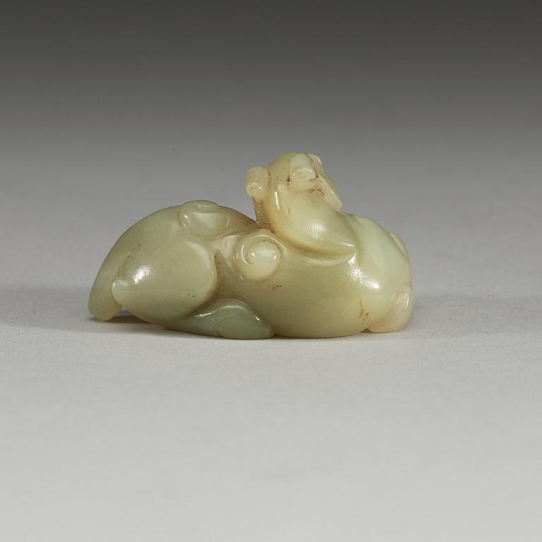 A Chinese nephrite figure of a reclining horse.