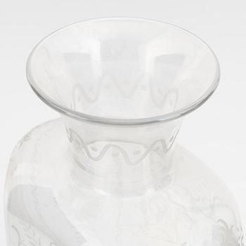 A hexagonal glass flask, 20th century.