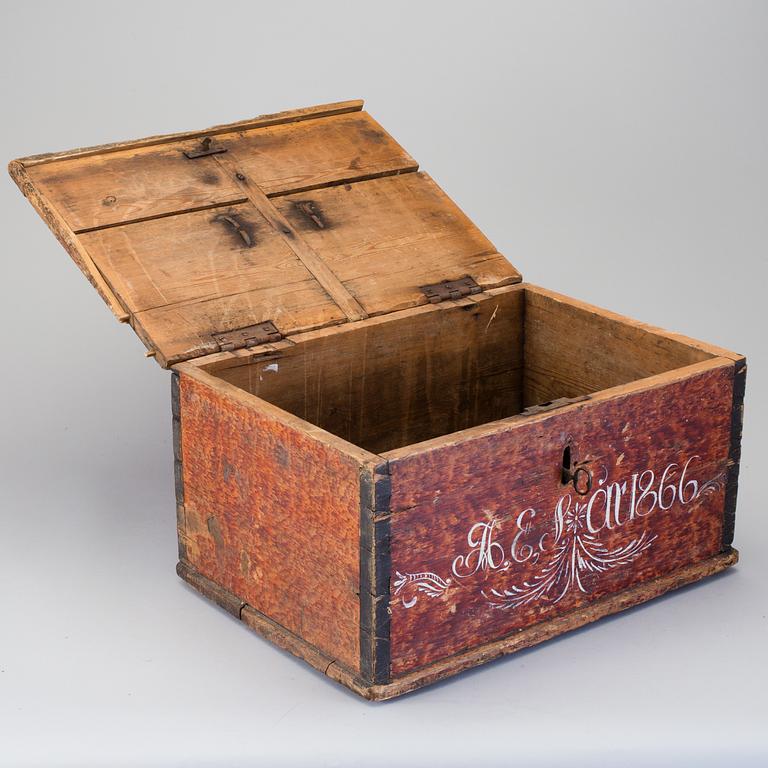 A folk wood box dated 1866.