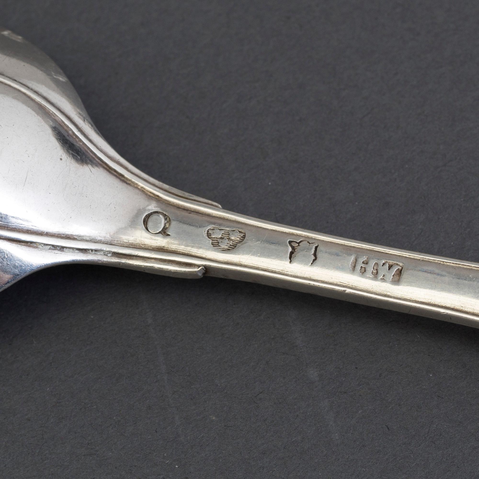 A lot of 12 silver spoons, hallmarks from Sweden, Germany and England, 18/19th century.