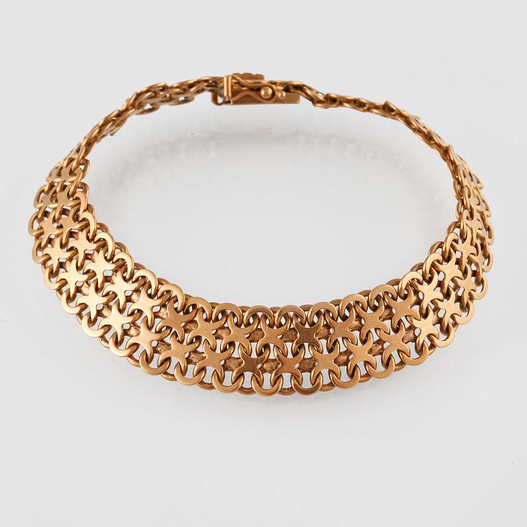 ARMBAND, 18K guld, M.K:S Guldsmedsatelier, Stockholm, 1962. Vikt 28g.