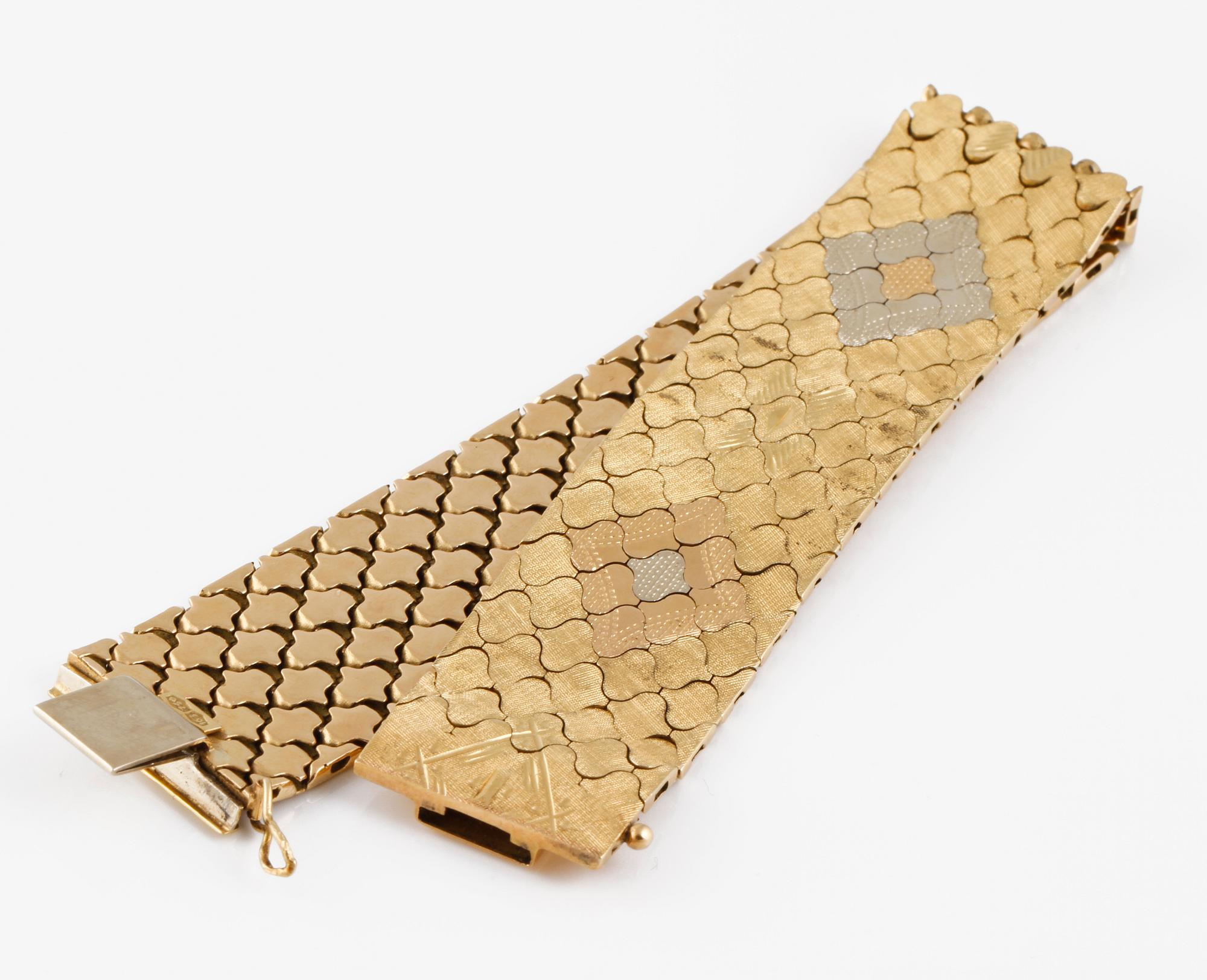 ARMBAND, 18K tvåfärgat guld, utländska stämplar. Vikt 52,9 gram.