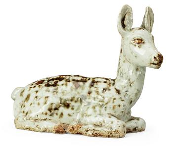 A Michael Schilkin stoneware sculpture of a deer, Arabia.