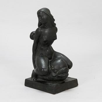 Ivar Johnsson, a painted plaster sculpture, signed.