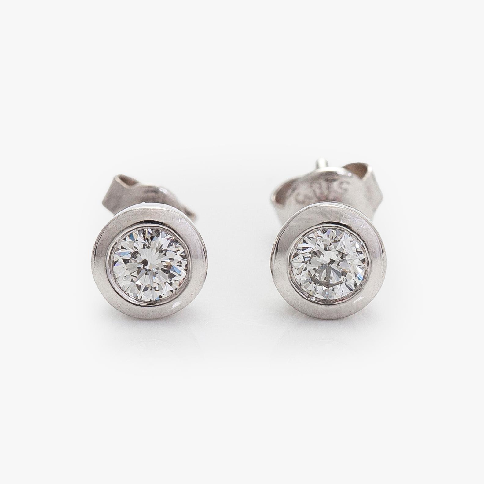 Earrings, brilliant-cut diamonds totalling circa 0.60 ct, 14K white gold.