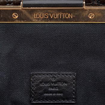 LOUIS VUITTON, a maroon "Monogram Motard Biker" shoulder bag.