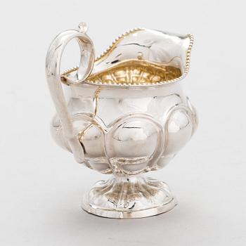 GUSTAF ADOLF BJÖRKLUND, Strösked, gräddsnäcka och skedar, silver, totalt 18 delar, Joensuu, Finland 1870.