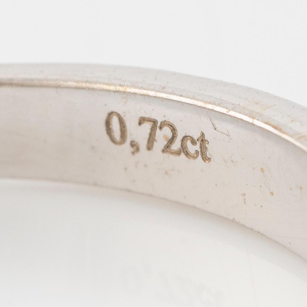 Ring 18K white gold half eternity band set with brilliant-cut diamonds.