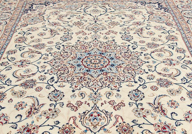 A carpet, Nain, part silk S.K 9LAA. Circa 352x248 cm.