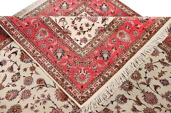 An old Tabriz carpet, part silk, 60 raj, c. 253 x 250 cm.