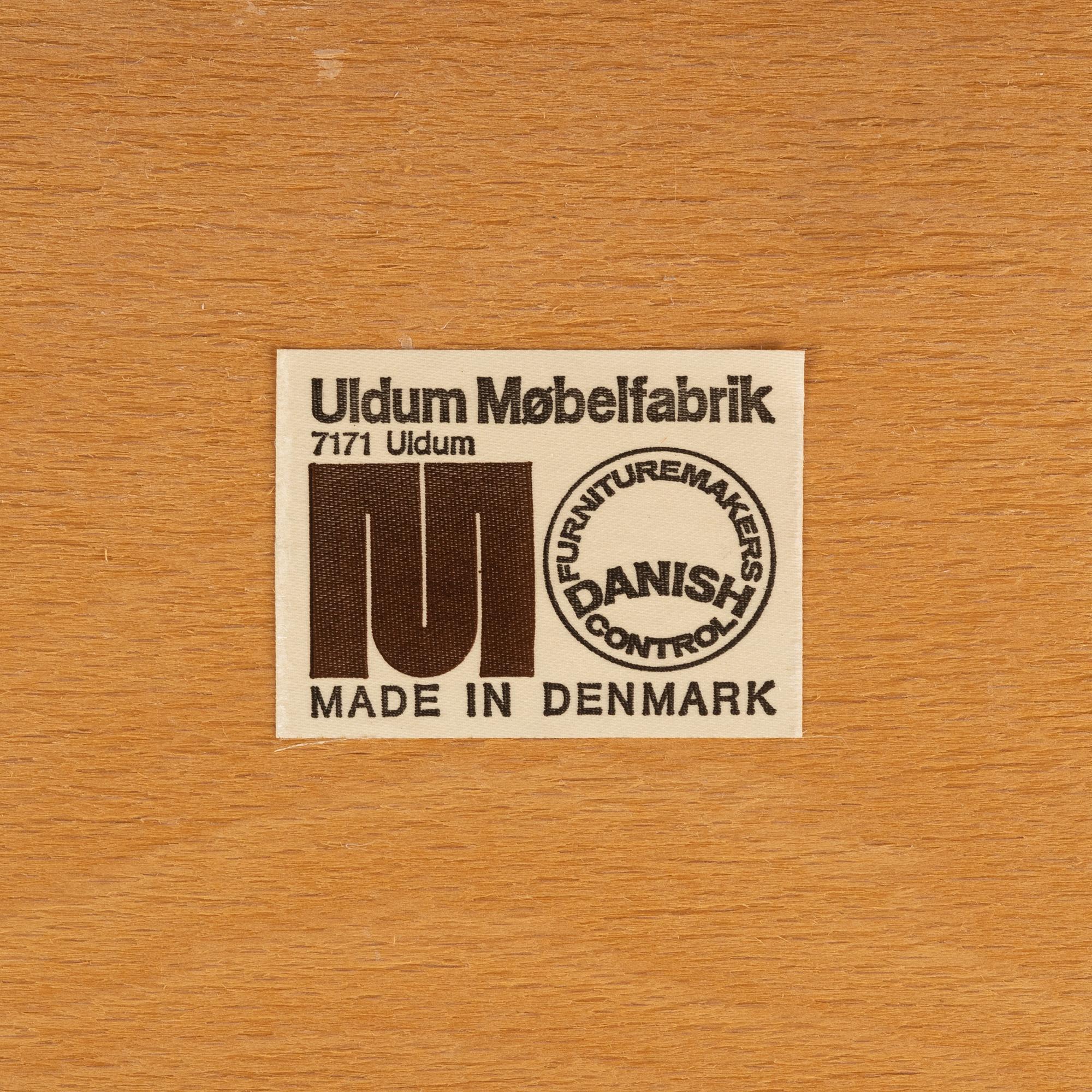 A dining table and six chairs, Uldum Møbelfabrik, Denmark, 1960's/70's.