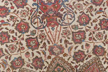 A Tabriz carpet, c. 390 x 305 cm.