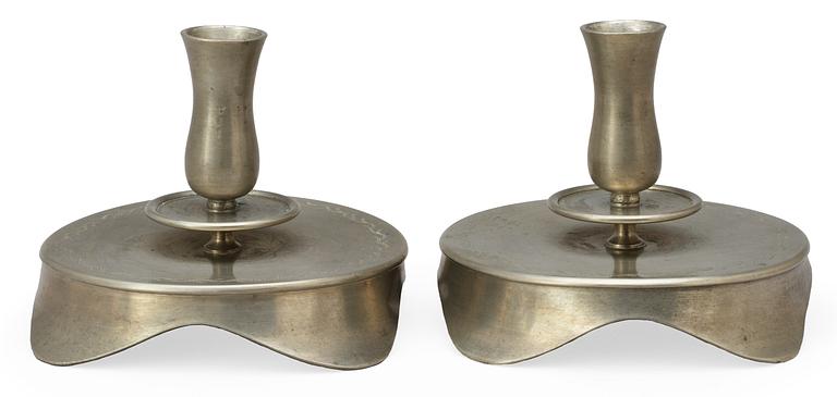 A pair of pewter candlesticks by Svenskt Tenn, Stockholm 1928.