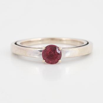 A tourmaline and brilliant cut diamond ring.