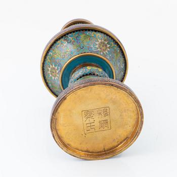 A Chinese cloisonné vase, a bowl and a candlestick, 20th Century.