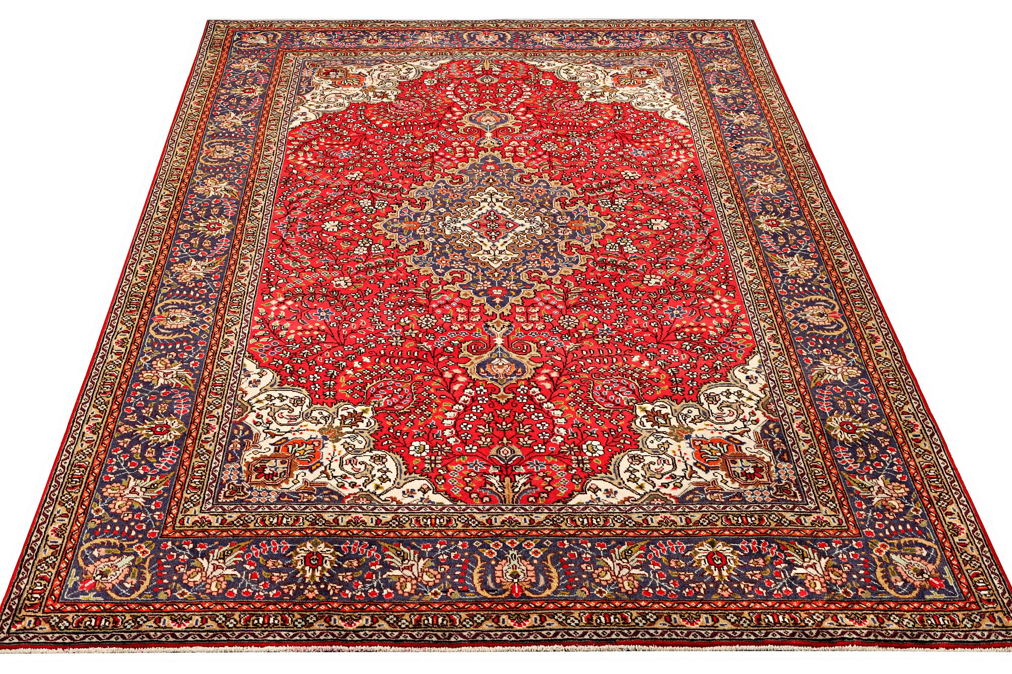 A Tabriz carpet, c 295 x 198 cm.