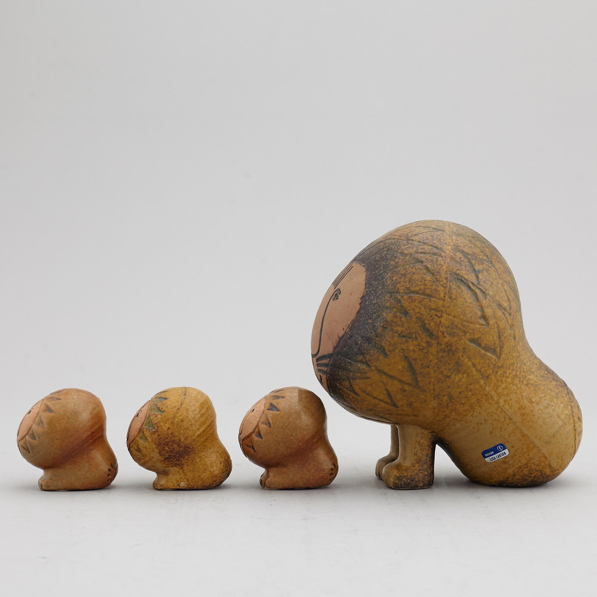 LISA LARSON, four stoneware lion figurines, Gustavsberg.