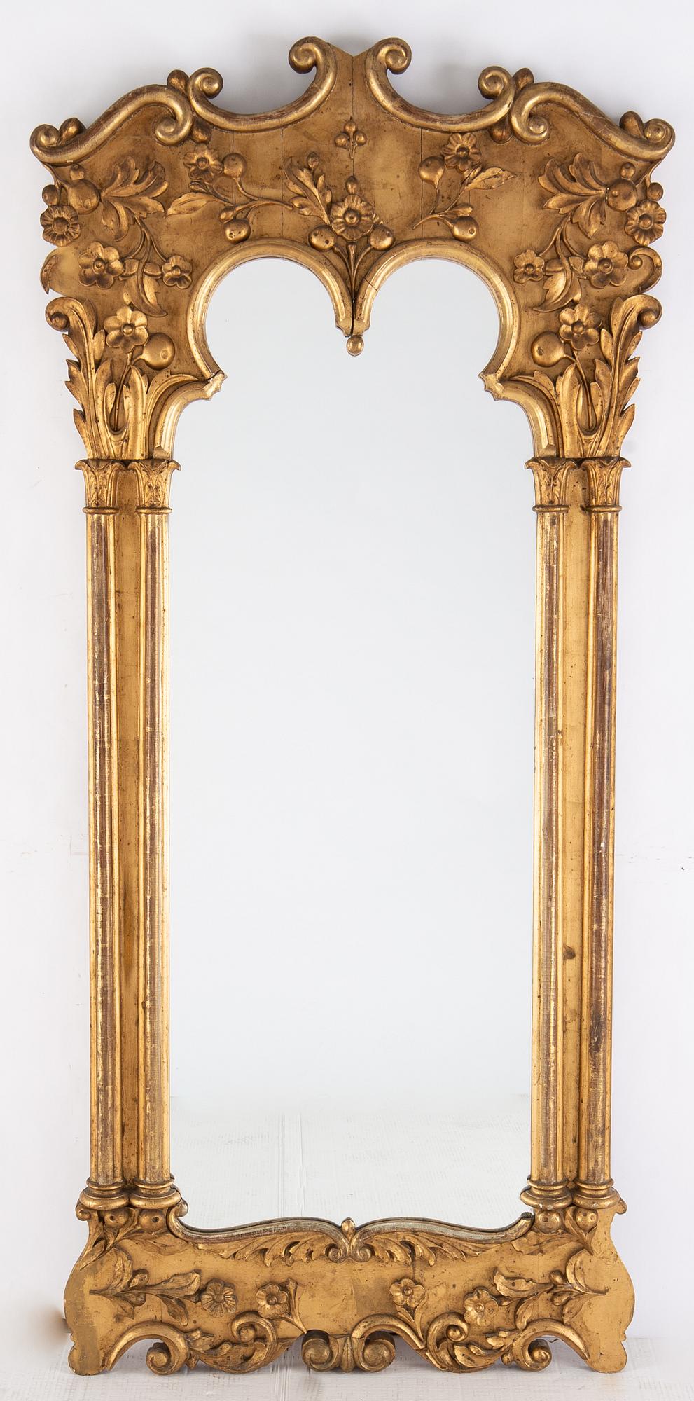 A late 19th century bronzed mirror.