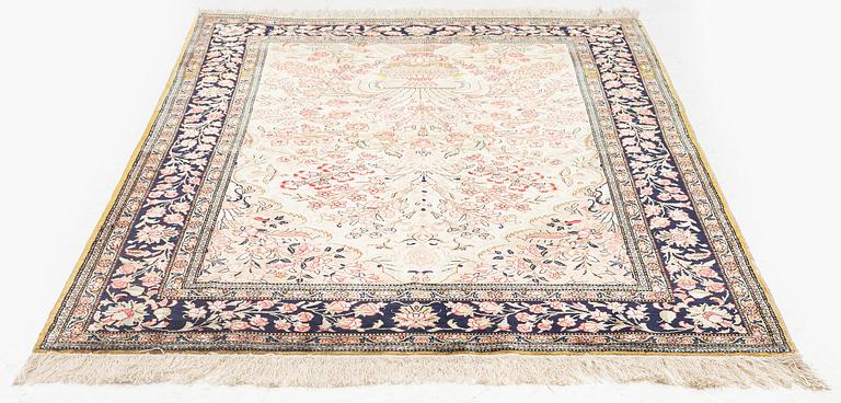 A silk Qum rug, c. 156 x 101 cm.