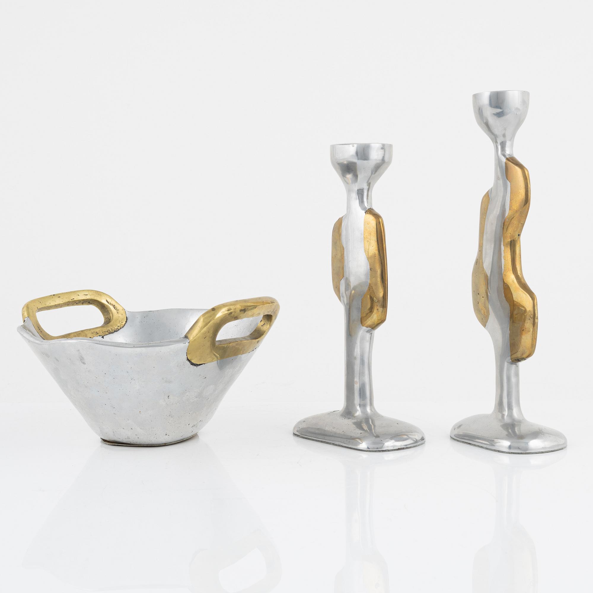 David Marshall, a metall and brass bowl and a pair of candle sticks.