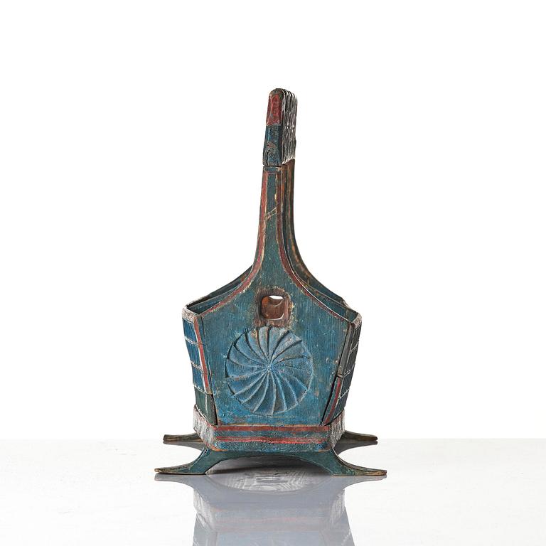 A Swedish folk art carved and painted bobin-holder, circa 1800.