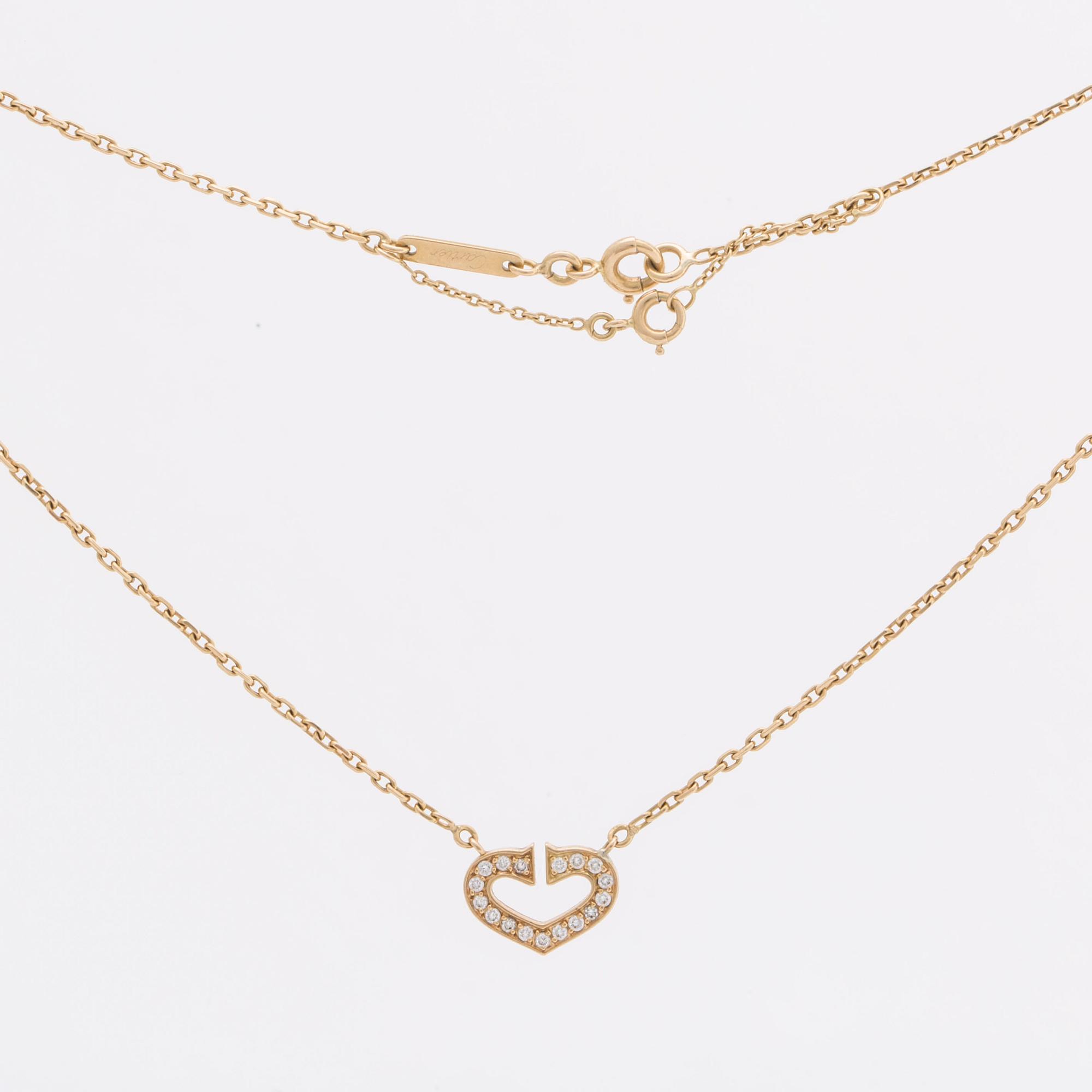 CARTIER 18K gold w briliant-cut diamonds approx 0,20 ct in total, Cartier certificate N40836, design "C Heart".